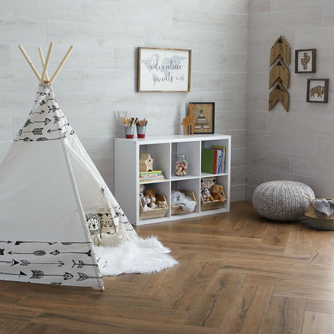 kid's bedroom with tent, toys, and shelves on wood look herringbone tile floor and walls