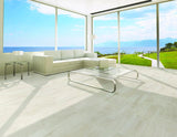 white oak color natural lookng wood tile show on living room floor with ocean view