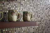 glass mosaics tile in shades of brown as a kitchen wall with owl coffee mugs