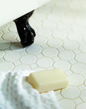 octagon tile with white matte dot on bathroom floor