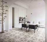 Beige paint porcelain pattern tile on the floor of a modern sitting room with tree.