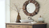 White sink basin, trendy bronze mirror and vase against natural Herringbone mosaic tile wall