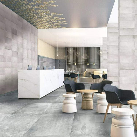 Icon porcelain tile on the floors and walls of a modern commercial lobby