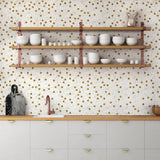 Posh chiffon hexagon mosaic tiles on light modern kitchen backsplash featuring floating shelves.