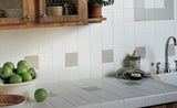 white and uptown taupe ceramic tile shown as kitchen backsplash